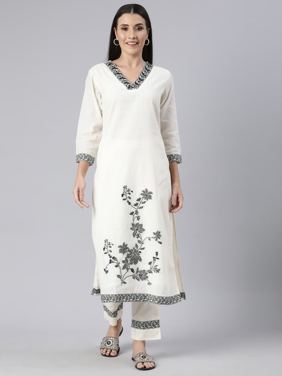 Neerus Cream Regular Straight Floral Kurta And  Trousers