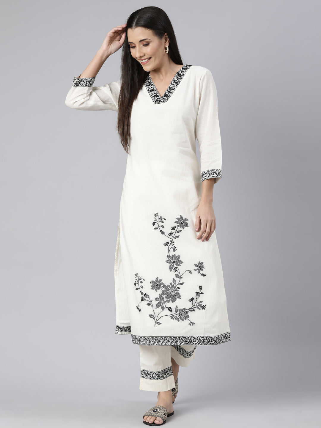 Neerus Cream Regular Straight Floral Kurta And  Trousers