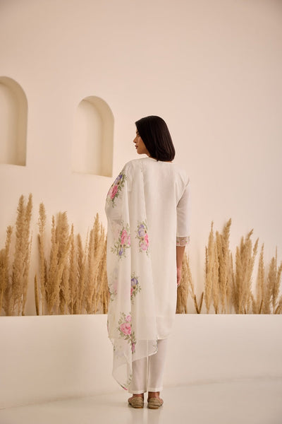 Neerus White Straight Embellished Kurta And Trousers With Dupatta.