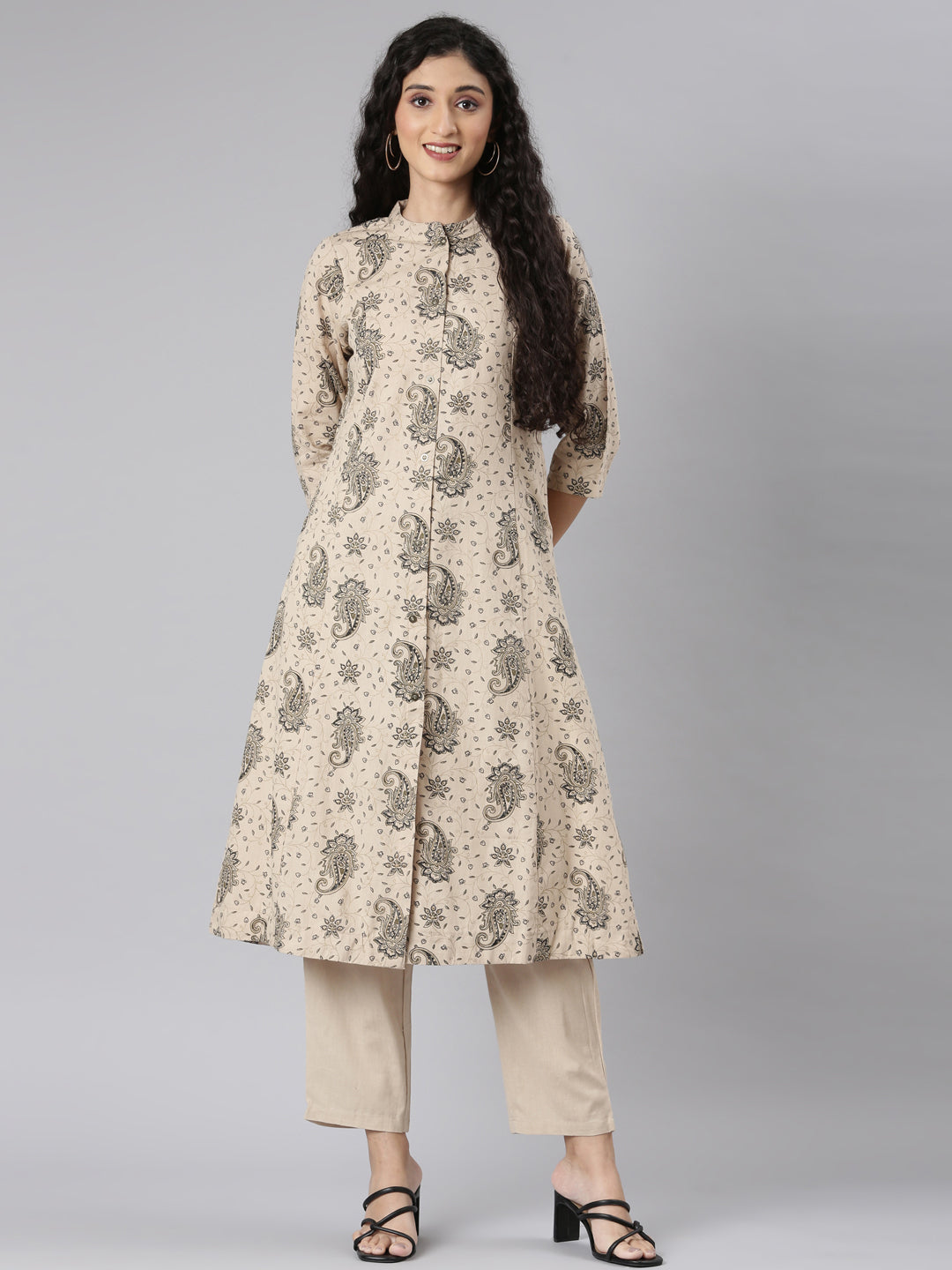 Neerus Beige Straight Casual Floral Kurta and Trouser.