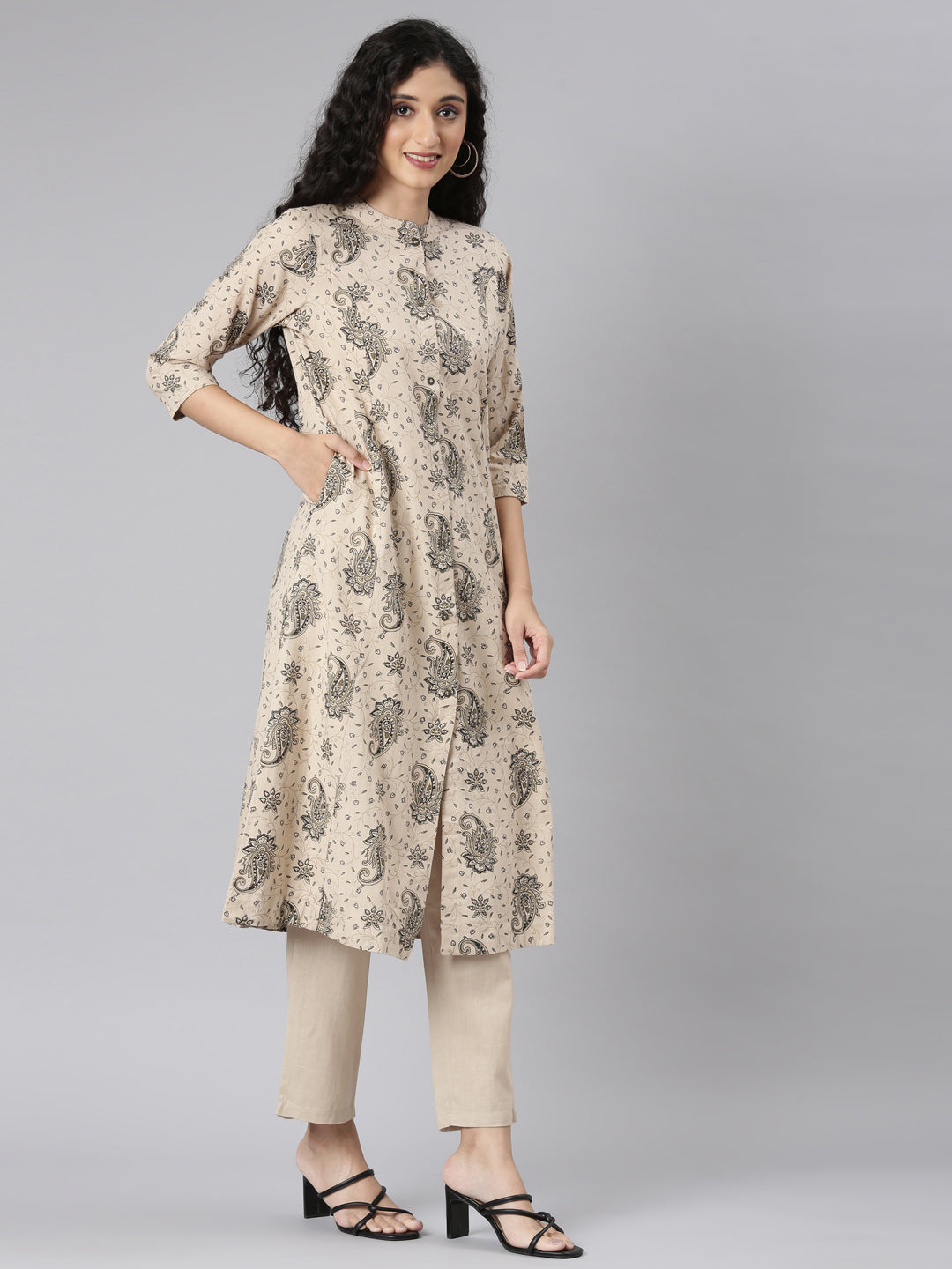 Neerus Beige Straight Casual Floral Kurta and Trouser.