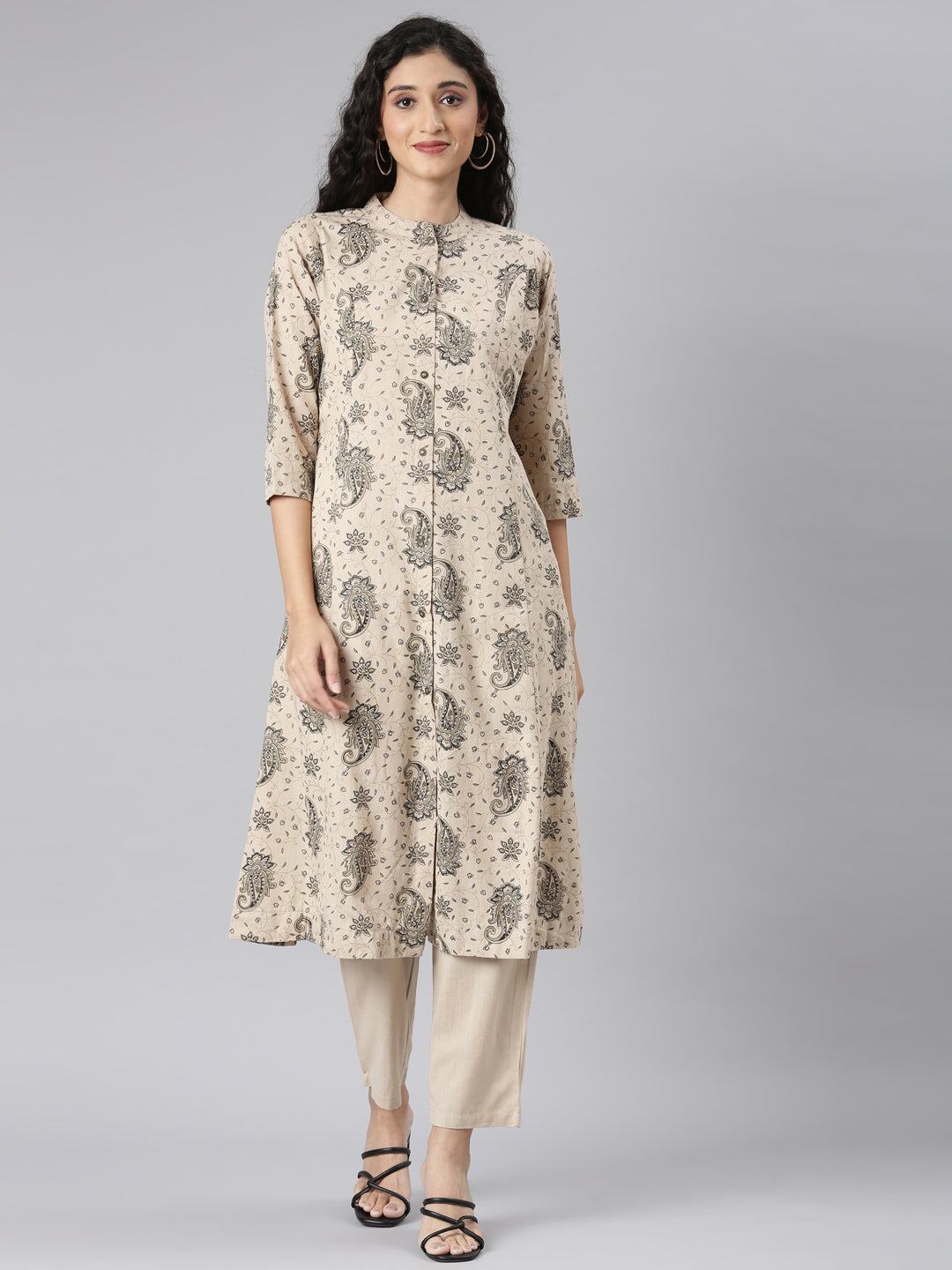 Neerus Beige Straight Casual Floral Kurta and Trouser.