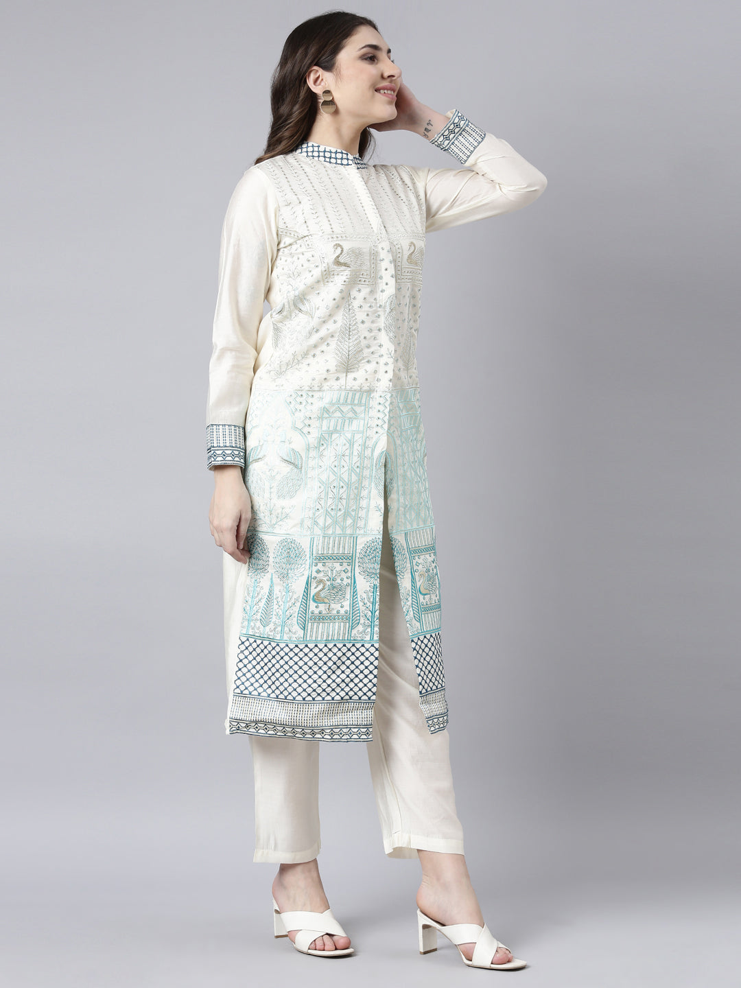 Neerus Cream Regular Straight Animal Kurta And Trousers