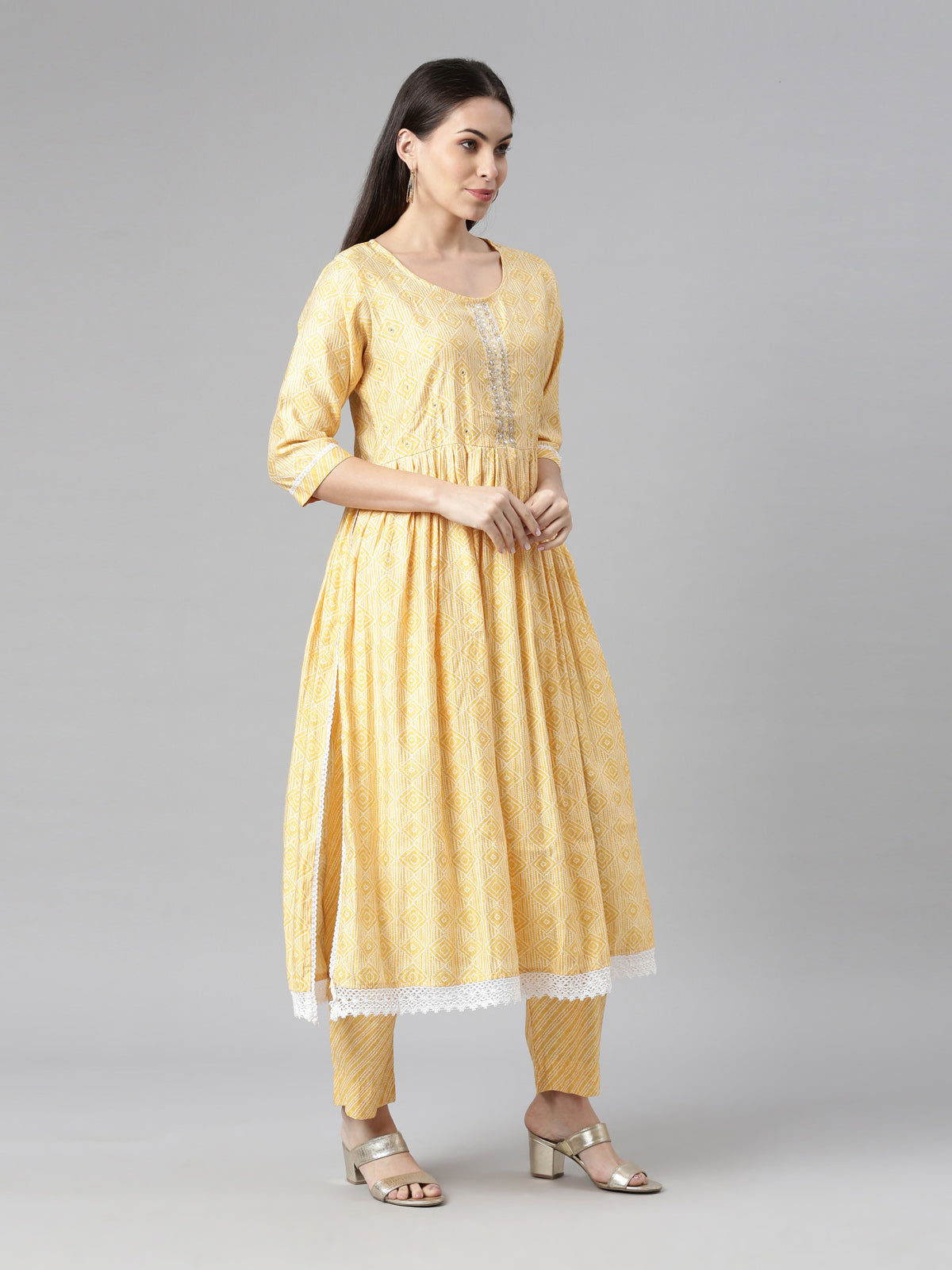 Neerus Women Yellow Printed Pleated Kurta with Trouser  With Dupatta Set