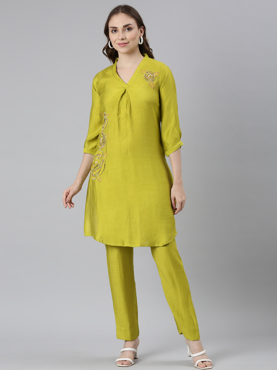 Neerus Green Regular Curved Solid Kurti and Trousers