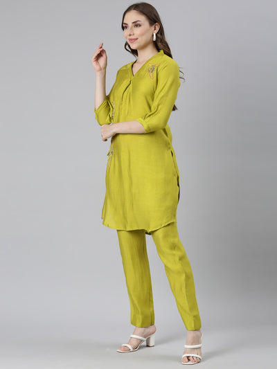 Neerus Green Regular Curved Solid Kurti and Trousers