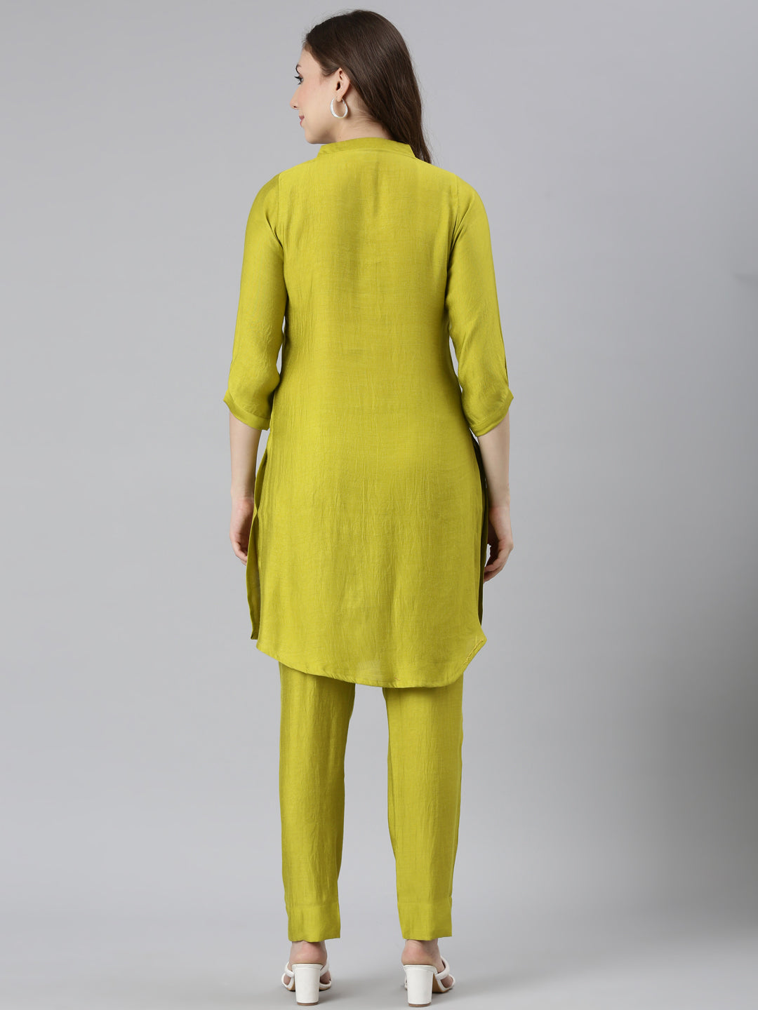 Neerus Green Regular Curved Solid Kurti and Trousers