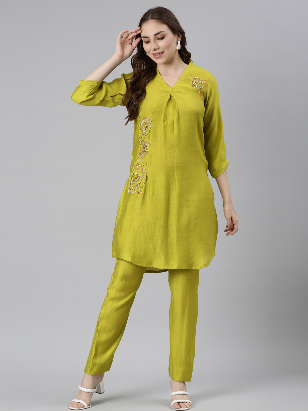 Neerus Green Regular Curved Solid Kurti and Trousers