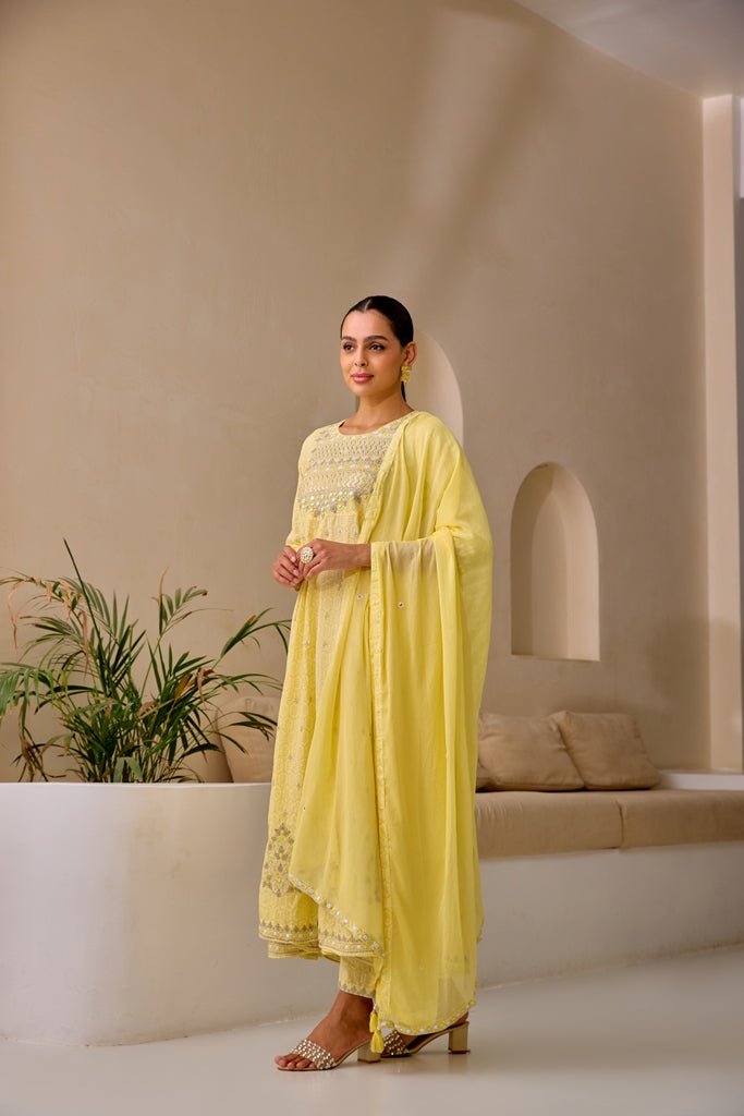 Neerus Yellow Curved Sequence Work Kurta And Trousers With Dupatta