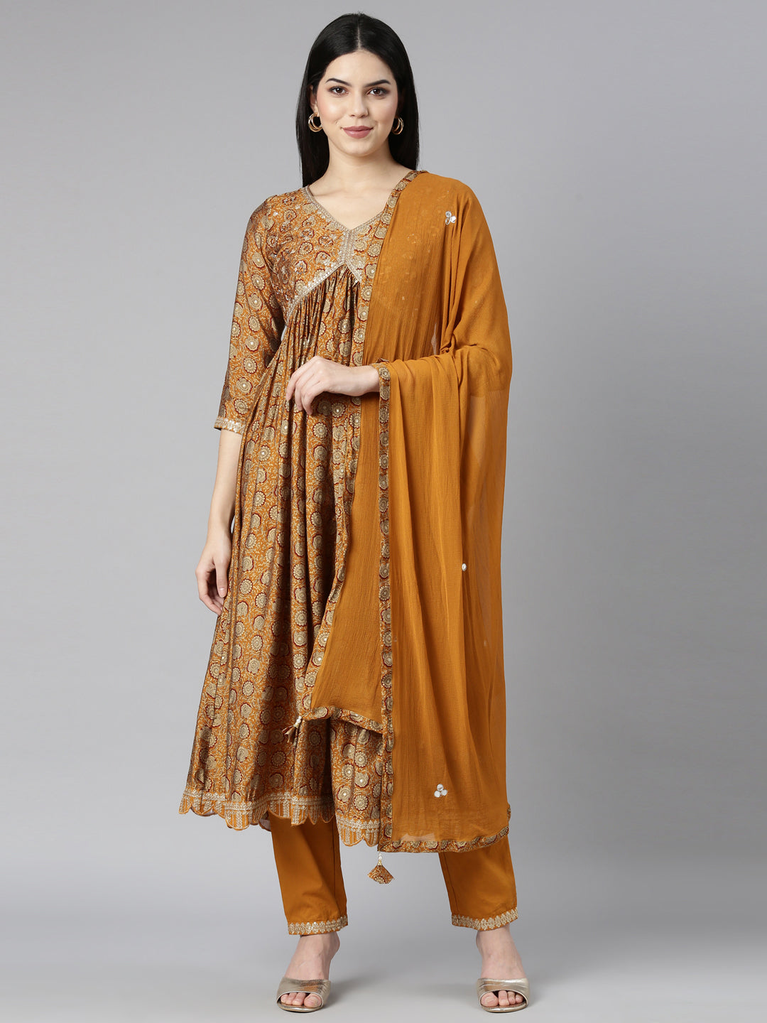 Neerus Mustard Pleated Straight Floral Kurta And Trousers With Dupatta