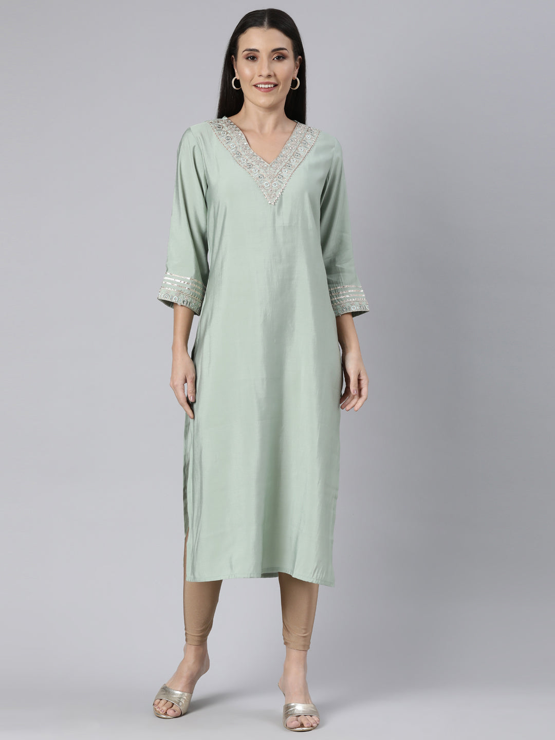 Neerus Green Regular Straight Solid Kurtas