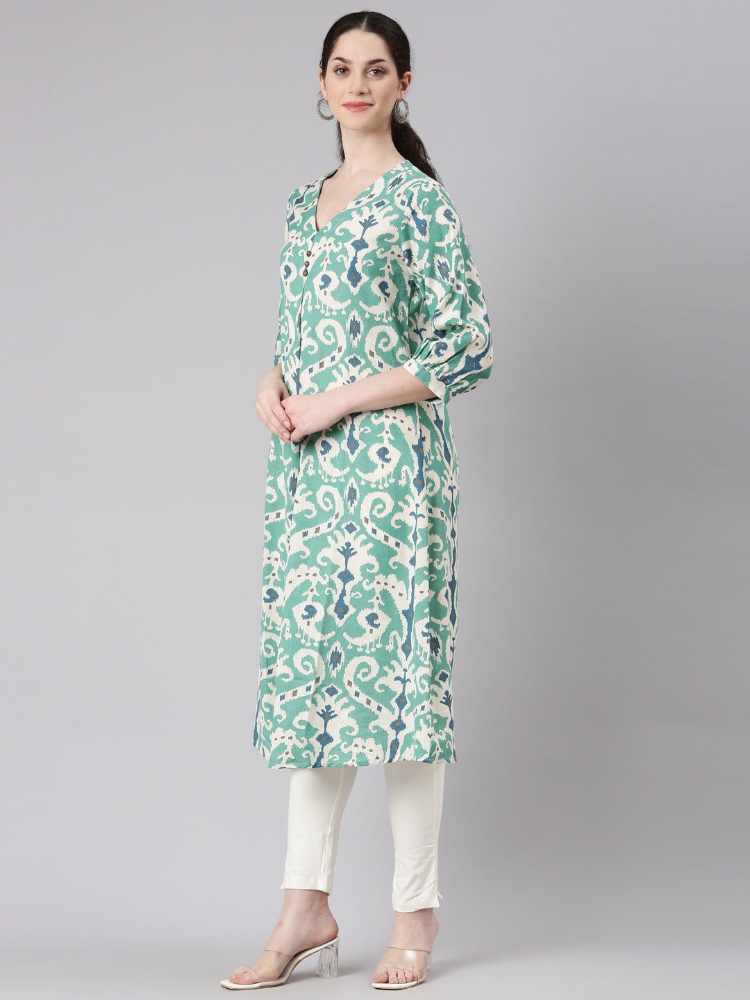 Neerus Green Curved Casual Tribal Panelled Kurtas