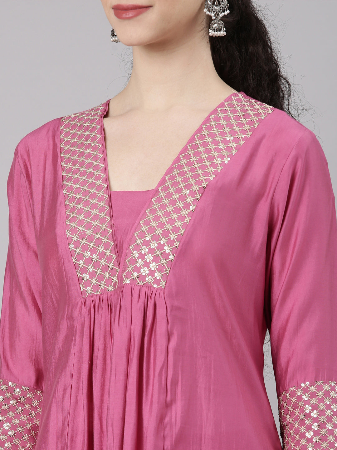 Neerus Pink Curved Casual Solid Kurta and Trouser