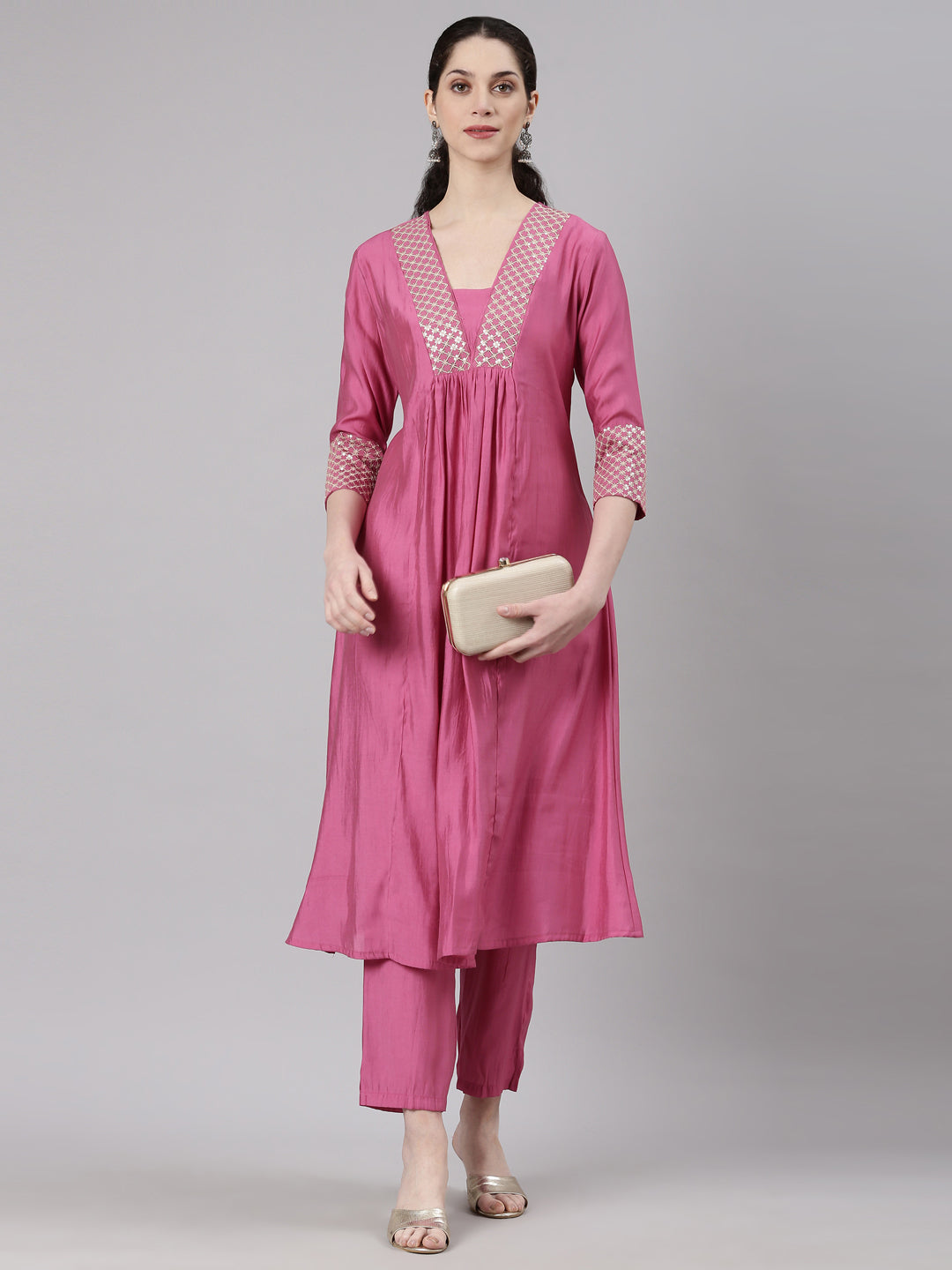 Neerus Pink Curved Casual Solid Kurta and Trouser