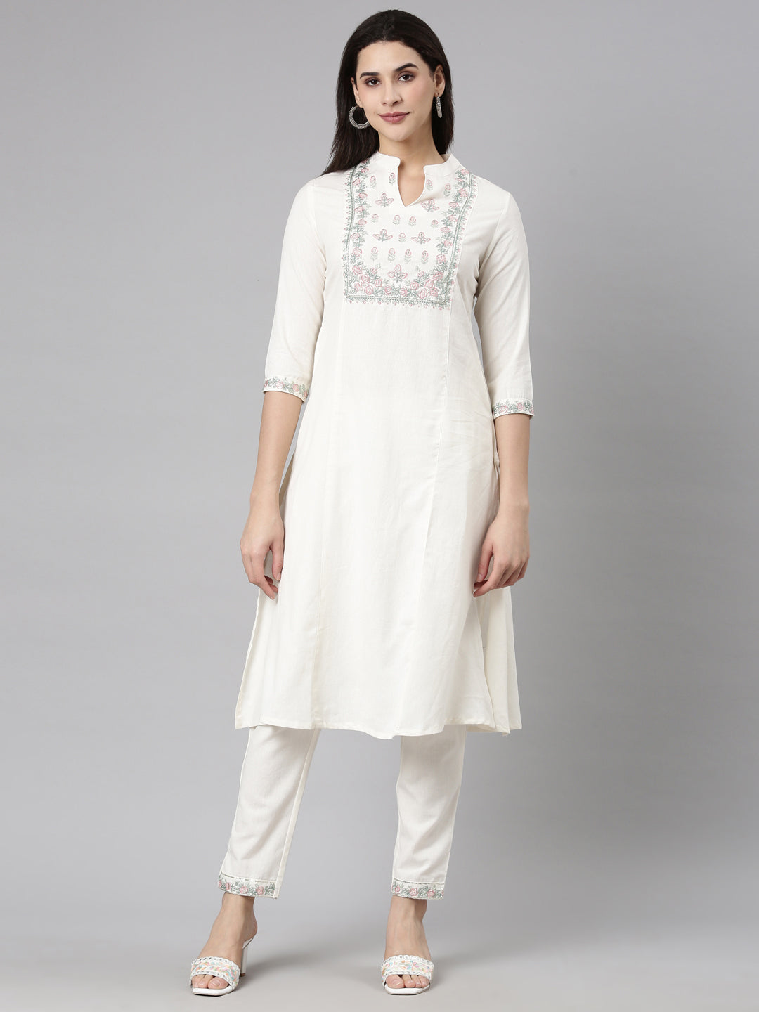 Neerus Cream Regular Straight Solid Kurta And  Trousers