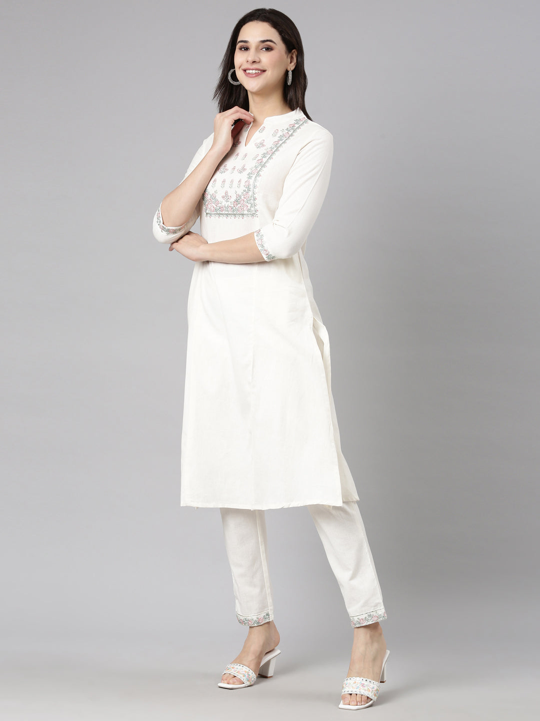 Neerus Cream Regular Straight Solid Kurta And  Trousers