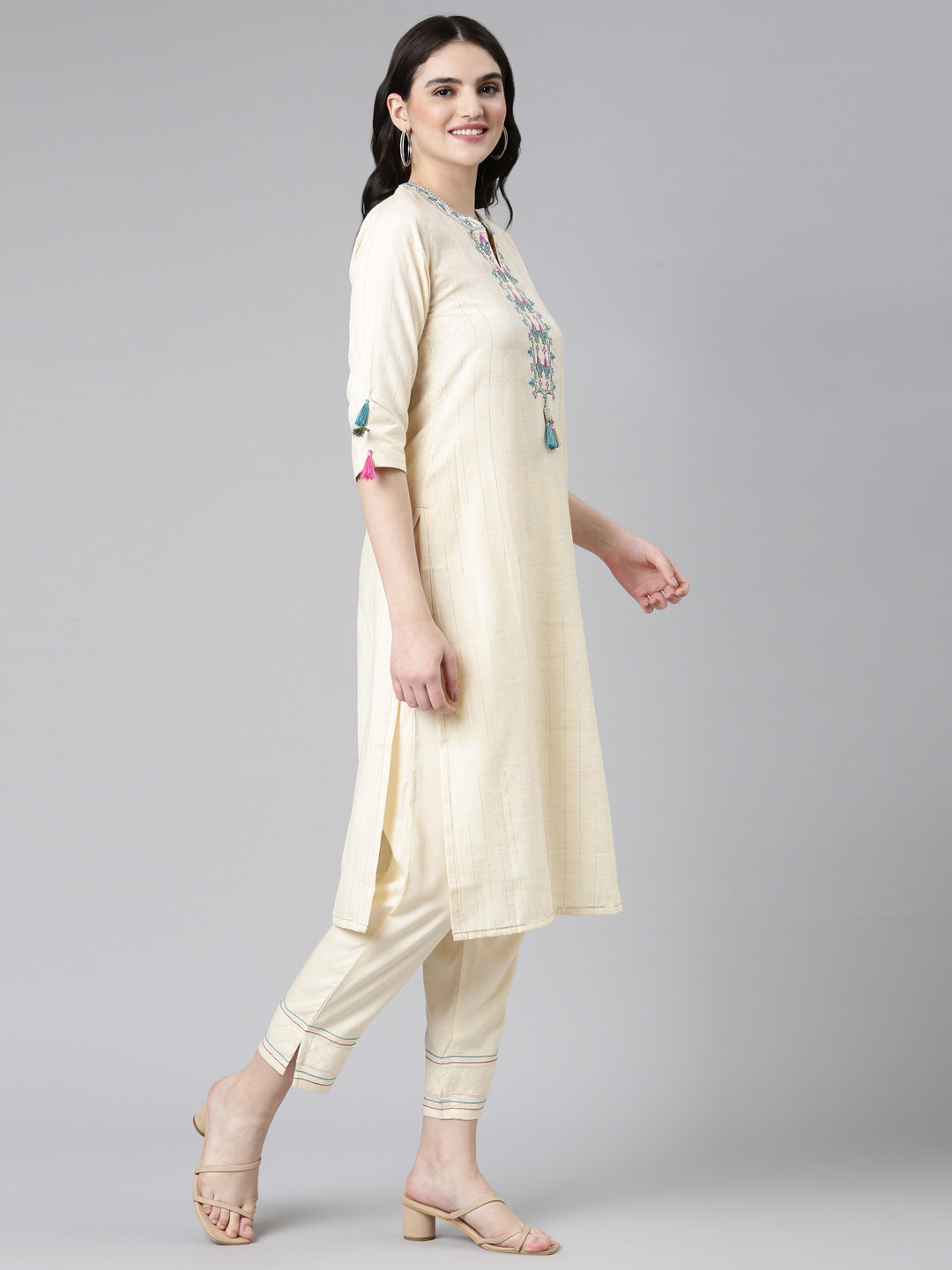 Neeru's Cream Regular Straight Solid Kurta And Trousers