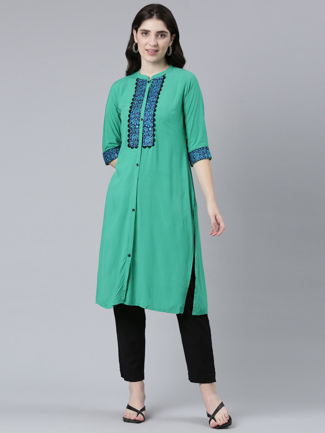 Neeru's Green Regular Straight Solid Kurtas