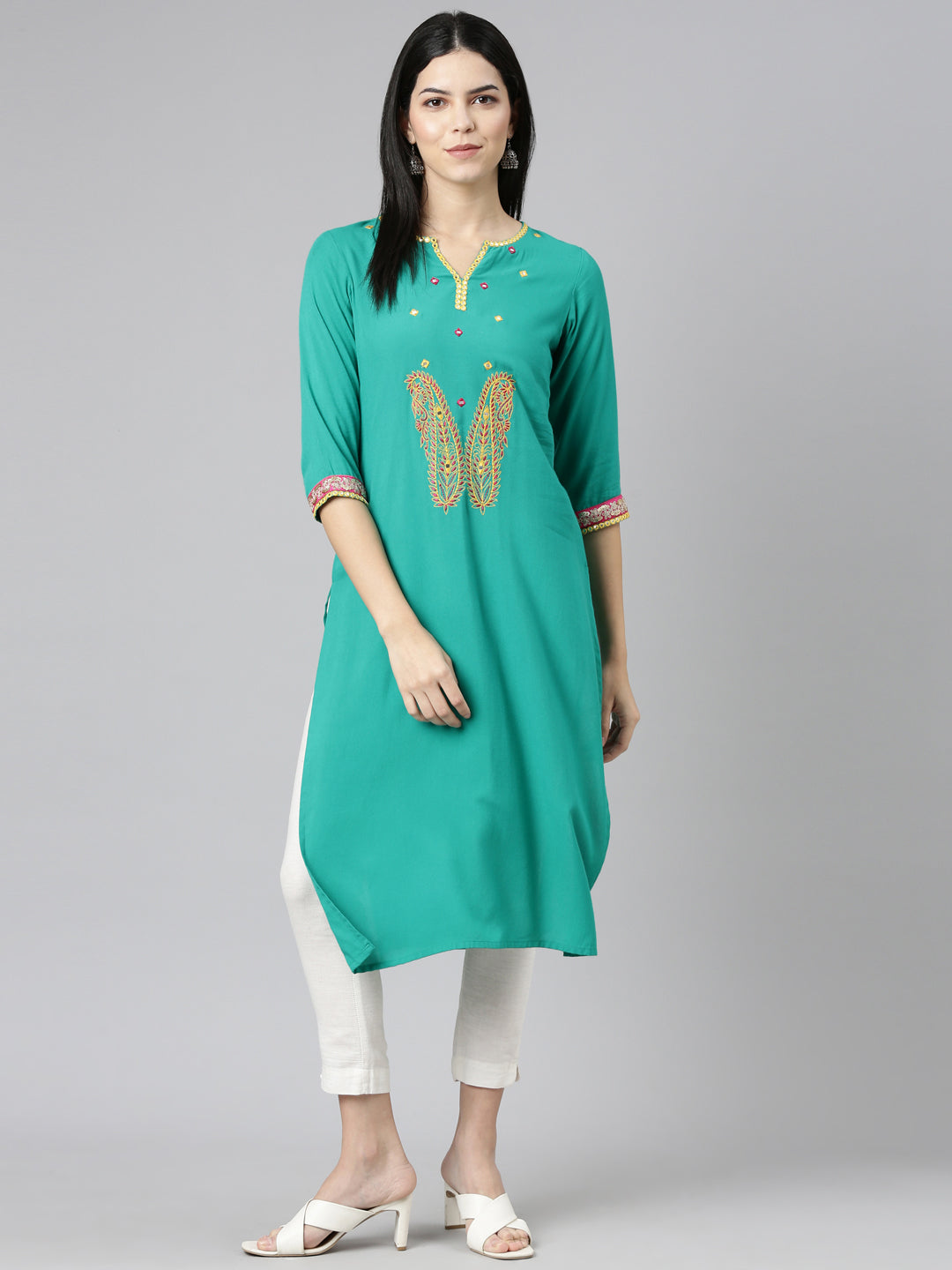 Neeru's Green Regular Straight Solid Kurtas