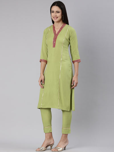 Neeru's Green Regular Straight Solid Kurta And Trousers