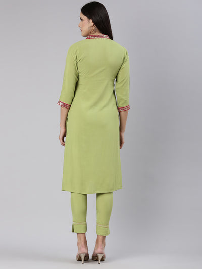 Neeru's Green Regular Straight Solid Kurta And Trousers