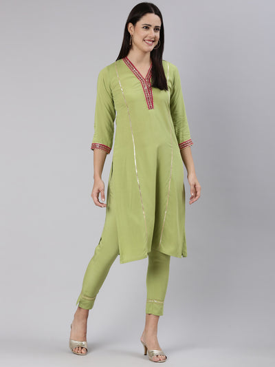 Neeru's Green Regular Straight Solid Kurta And Trousers