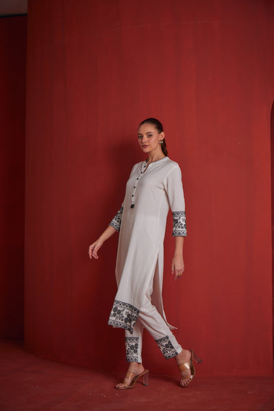 Neeru's White Regular Straight Solid Kurta Sets And Trousers