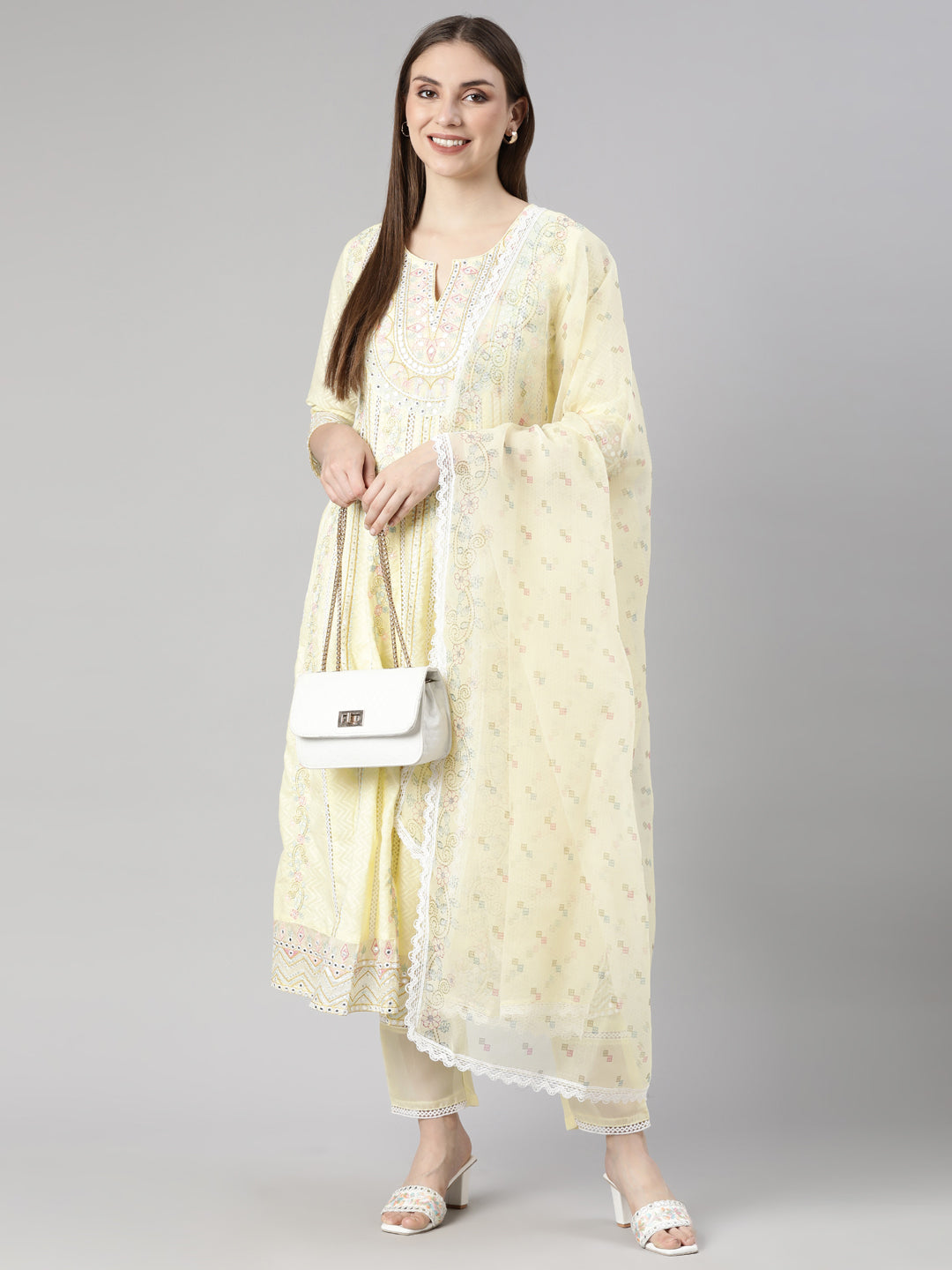 Neerus Yellow Regular Flared Floral Readymade suits