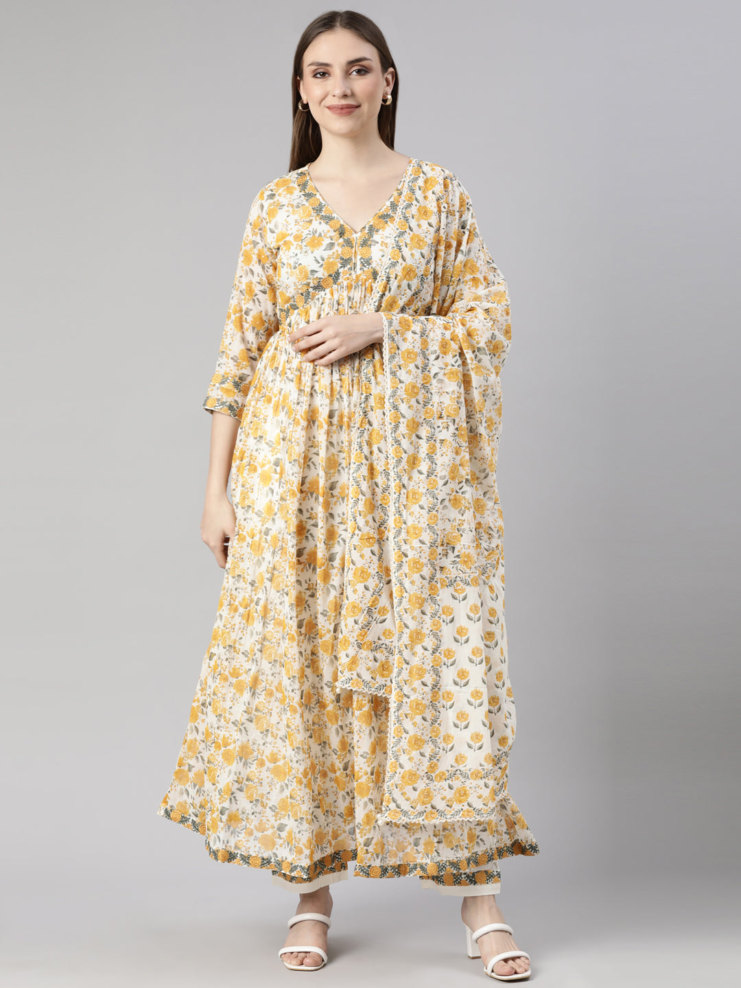 Neerus Mustard Pleated Flared Floral Kurta And  Trousers With Dupatta