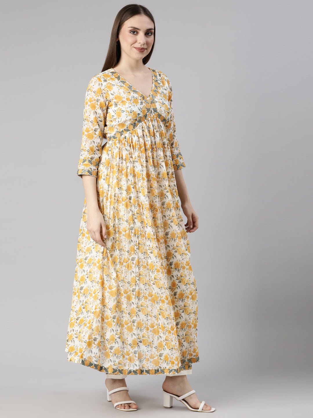 Neerus Mustard Pleated Flared Floral Kurta And  Trousers With Dupatta