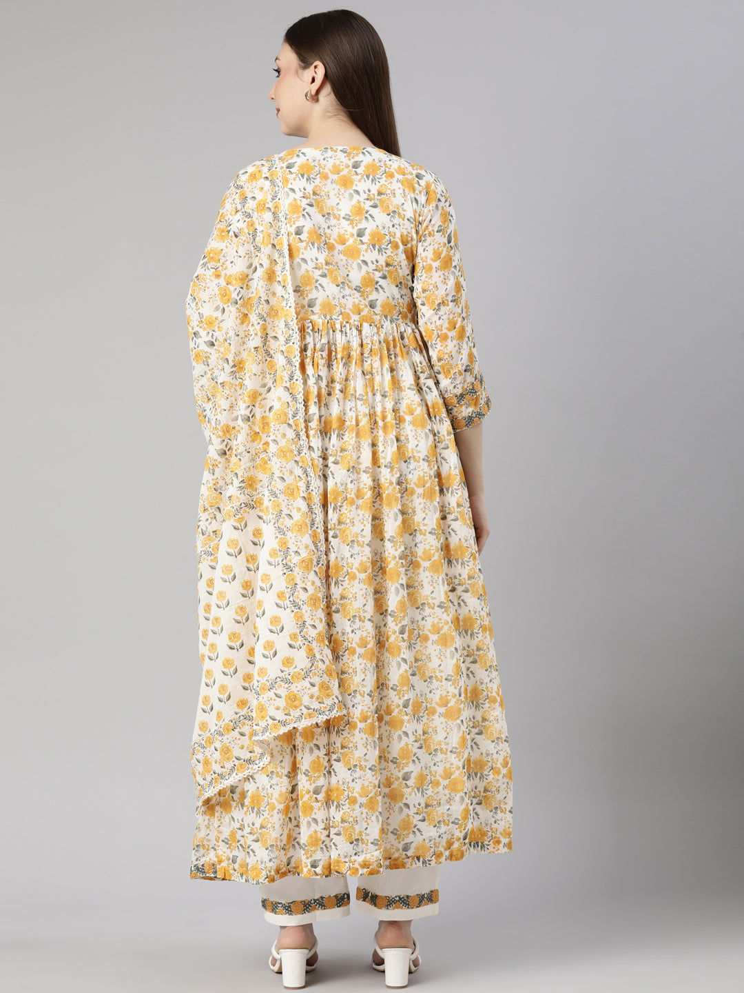 Neerus Mustard Pleated Flared Floral Kurta And  Trousers With Dupatta