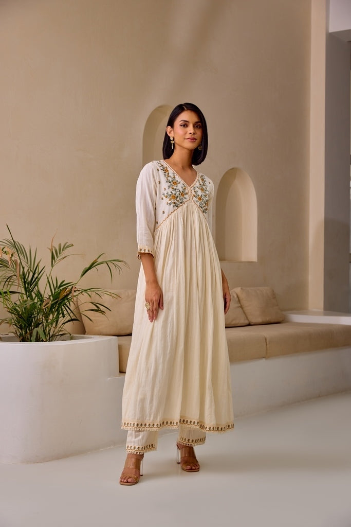 Neerus Cream Flared Embroidery Kurta And Trousers With Dupatta