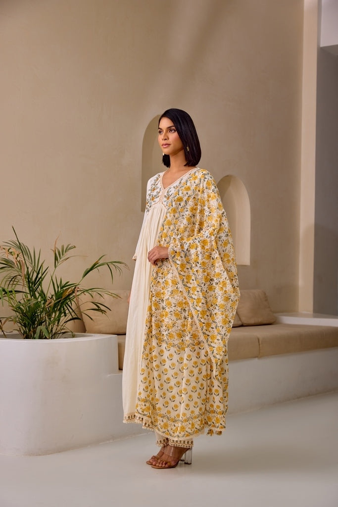 Neerus Cream Flared Embroidery Kurta And Trousers With Dupatta