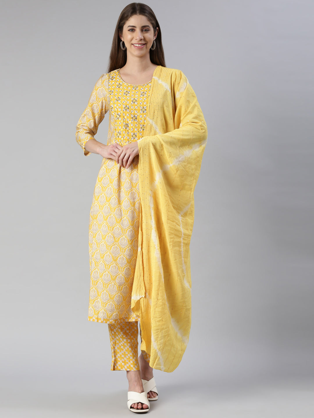 Neeru's Women Yellow Yoke Design Calf Length Kurta And Trousers With Dupatta