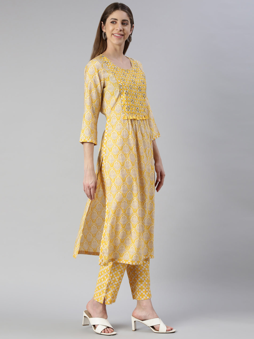 Neeru's Women Yellow Yoke Design Calf Length Kurta And Trousers With Dupatta