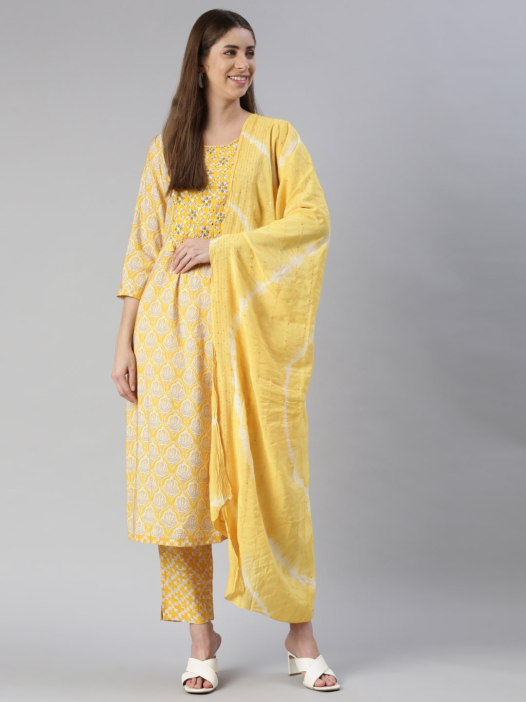 Neeru's Women Yellow Yoke Design Calf Length Kurta And Trousers With Dupatta