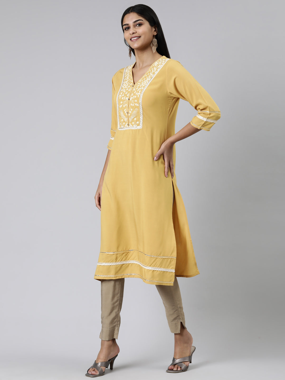 Neeru's Mustard Straight Embroidered Viscose Rayon Kurtas