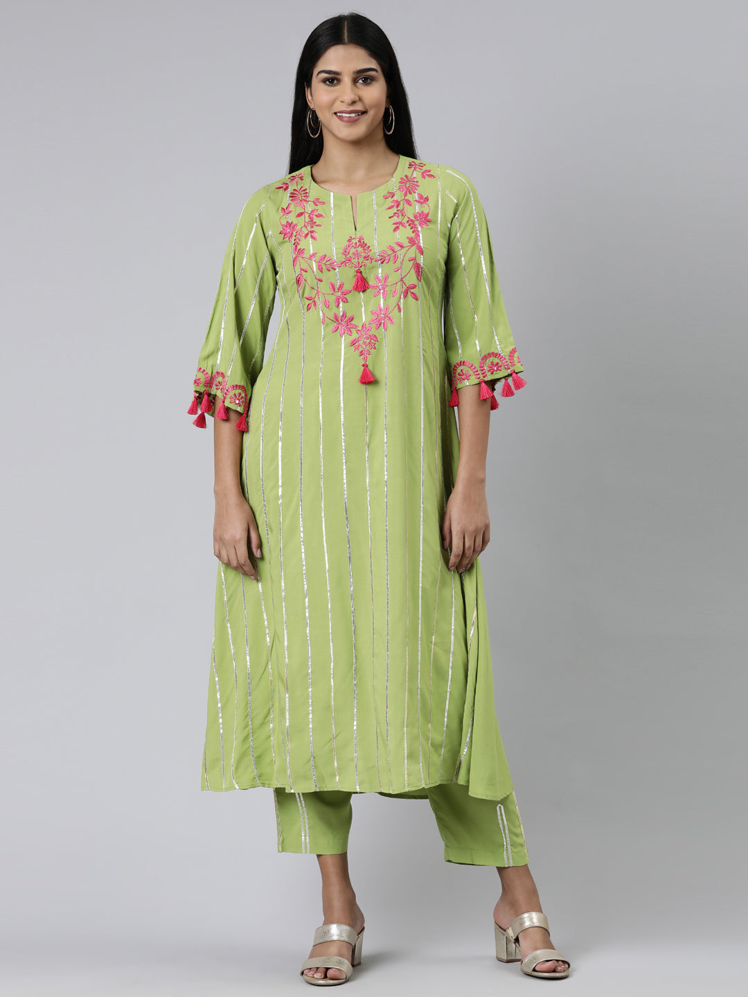 Neeru's Green Regular Calf Length Solid Kurta Solid Trousers